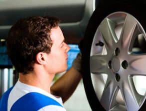 Mechanic changing tire